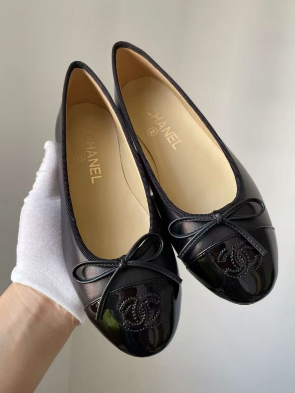 CHANEL Two Tone Black Leather Bow Ballet Flats